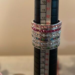 Size seven set of four lovely standing rings. Not connected so wear as many/few.